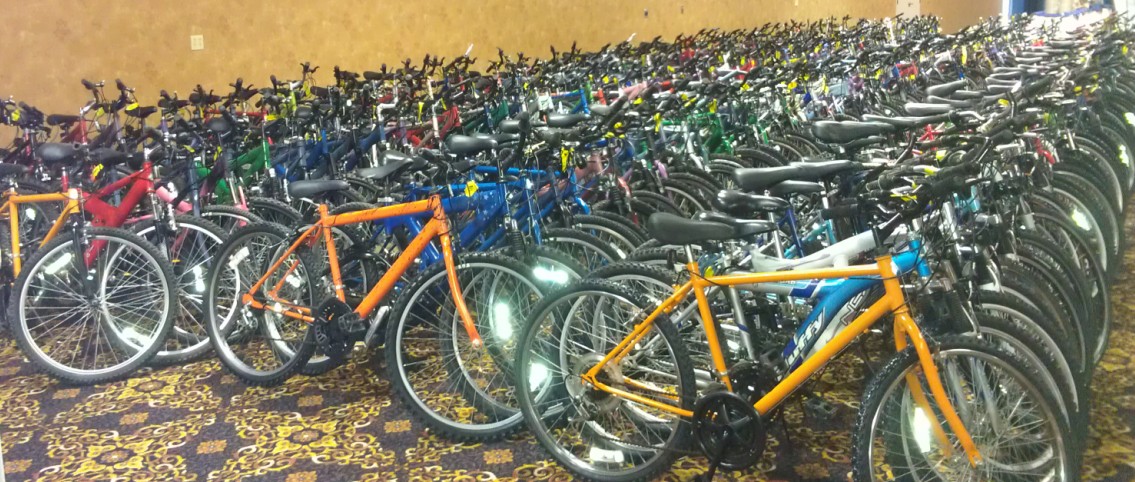 Refurbished bicycles are distributed at the annual Law Enforcement Game Feed in Sioux Falls
