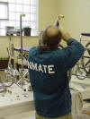 An inmate in Springfield working on wheelchairs. 