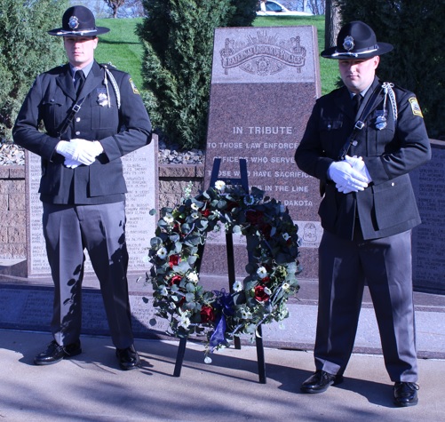 SDDOC Honor Guard members by wreath at Law Enforcement Memorial